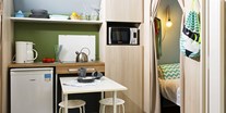 Luxuscamping - Cocosuite 4 Personen 2 Zimmer  von Vacanceselect auf Camping Cala Canyelles