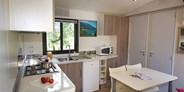 Luxuscamping - Venetien - Mobilheim Moda 5/6 Personen 2 Zimmer Klimaanlage von Vacanceselect auf Camping Ca'Savio