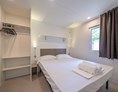 Glampingunterkunft: Mobilheim Moda 6 Personen 3 Zimmer Klimaanlage von Vacanceselect auf Camping Union Lido