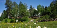 Luxuscamping - Umgebungsschwerpunkt: See - Österreich - Safari-Lodge-Zelte - Safari-Lodge-Zelt "Elephant" am Nature Resort Natterer See
