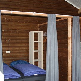 Glampingunterkunft: Schlafzimmer - Zwaluwlodge bei Camping de Kleine Wolf