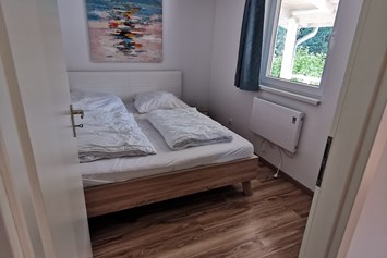 Glampingunterkunft: Typisches Schlafzimmer (in Typ 4 2x) - Bungalows ostseequelle.camp