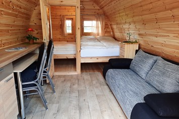 Glampingunterkunft: Pod mit Kinderzimmer Matratze 1,40m x 1,40 m - Nord-Ostsee Camp Camping Pod