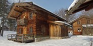 Luxuscamping - Geschirrspüler - Österreich - Winter im Almdorf am Grubhof - Almhütte Scheffsnother Stube im Almdorf Grubhof