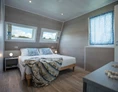 Glampingunterkunft: Schlafzimmer mit Doppelbett - Bungalow Garden