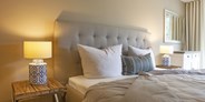 Luxuscamping - PLZ 79199 (Deutschland) - Ansicht Schlafbereich mit bequemem Doppelbett - luxuriöse Ferienwohnung  in Kirchzarten / Schwarzwald