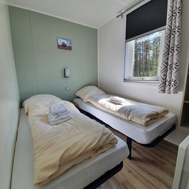 Glampingunterkunft: Schlafzimmer 2 - Heide-Lodge auf Campingplatz "Auf dem Simpel"