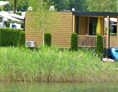Glampingunterkunft: Direkt am  See - Premium Mobilheime mit Terrassen am Terrassen Camping Ossiacher See