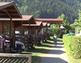 Glampingunterkunft: Unsere Campingbungalows in ruhiger Lage sind ideal für einen komfortvollen Urlaub! - Bungalow mit Terrassen am Camping Ossiacher See