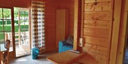 Luxuscamping - Kärnten - Natürlich - Bungalow mit Terrassen am Camping Ossiacher See