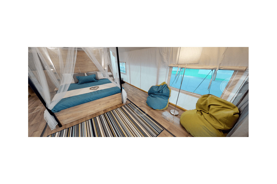 Glamping: Lakeside romantic Tent Schlafzimmer mit Doppelbett - Lakeside Petzen Glamping Resort