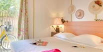 Luxuscamping - Schlafzimmer mit Doppelbett - Camping Le Sérignan Plage