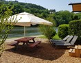 Glamping: Mit Liegen und großem Sonnenschirm - Fortuna Camping am Neckar