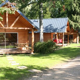 Glampingunterkunft: Huette Huttopia - Hütte Huttopia mit Holzofen auf Camping Huttopia Versailles