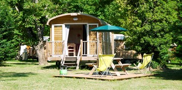 Luxuscamping - Privas - Zigeunerwagen auf Camping Huttopia Le Moulin
