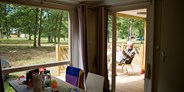 Luxuscamping - Centre - Cottage - Terrasse - Cottage für 6 Personen auf Camping Huttopia Les Chateaux