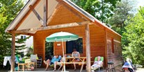 Luxuscamping - Auvergne - Camping Huttopia Royat Holzhaus auf Camping Huttopia Royat