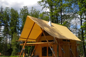 Glampingunterkunft: Cahutte Aussenansicht  - Cahutte für naturnahe Ferien auf Camping Huttopia Sud Ardèche