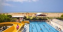 Luxuscamping - Pool mit großer Wasserrutsche - Villa Adria auf Villaggio Turistico Internazionale