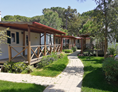 Glampingunterkunft: Außenansicht und der Terrasse - Mobilheim Residence Gold auf Camping Ca' Pasquali Village