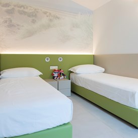 Glampingunterkunft: Schlafzimmer mit Einzelbetten - Residence Aurora auf Camping Vela Blu