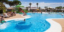 Luxuscamping - Whirlpool - Mobilheim Venezia Platinum auf Vela Blu Camping Village