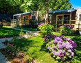 Glampingunterkunft: Mobilheime mit schönem Vorgarten auf Camping Montorfano  - Mobile homes