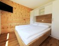 Glampingunterkunft: Doppelbettzimmer - Bungalows auf Camping Zögghof