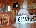 Glampingunterkunft: Komfort pur - See-Bungalow direkt am Terrassen Camping Ossiacher See