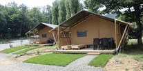 Luxuscamping - Kochmöglichkeit - Comfort Camping Tenuta Squaneto Comfort Lodge Zelte auf dem Comfort Camping Tenuta Squaneto