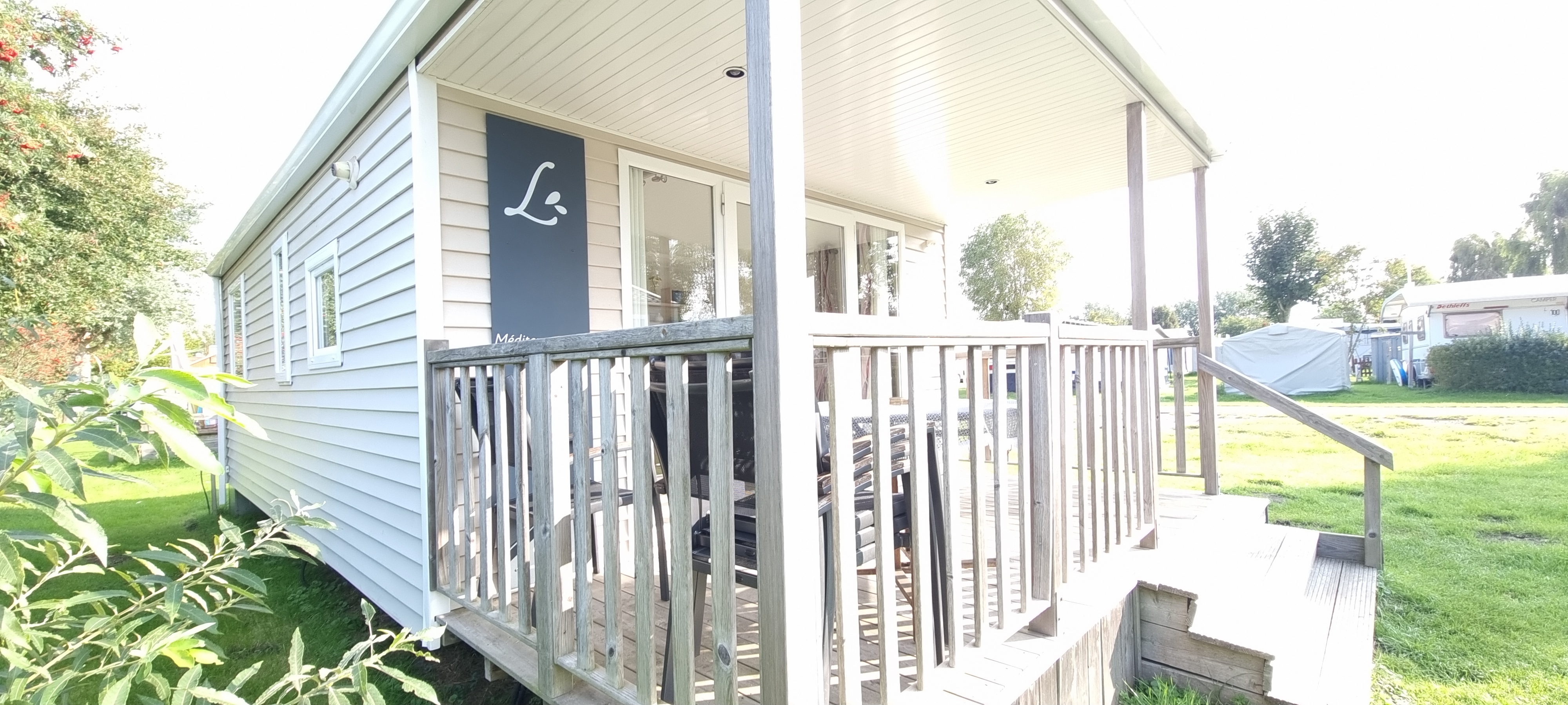 Luxury camping - Ostsee - Mobilheime direkt an der Ostsee - Campingplatz Wackerballig Mobilheim mit Seeblick