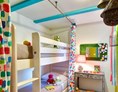 Glampingunterkunft: Ein Schlafzimmer mit Etagenbett - Cabane Jardin für 6 Personen am Camping Le Sérignan Plage
