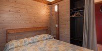 Luxuscamping - TV - Italien - Eurcamping Mini Lodge Lagrein auf  Eurcamping 