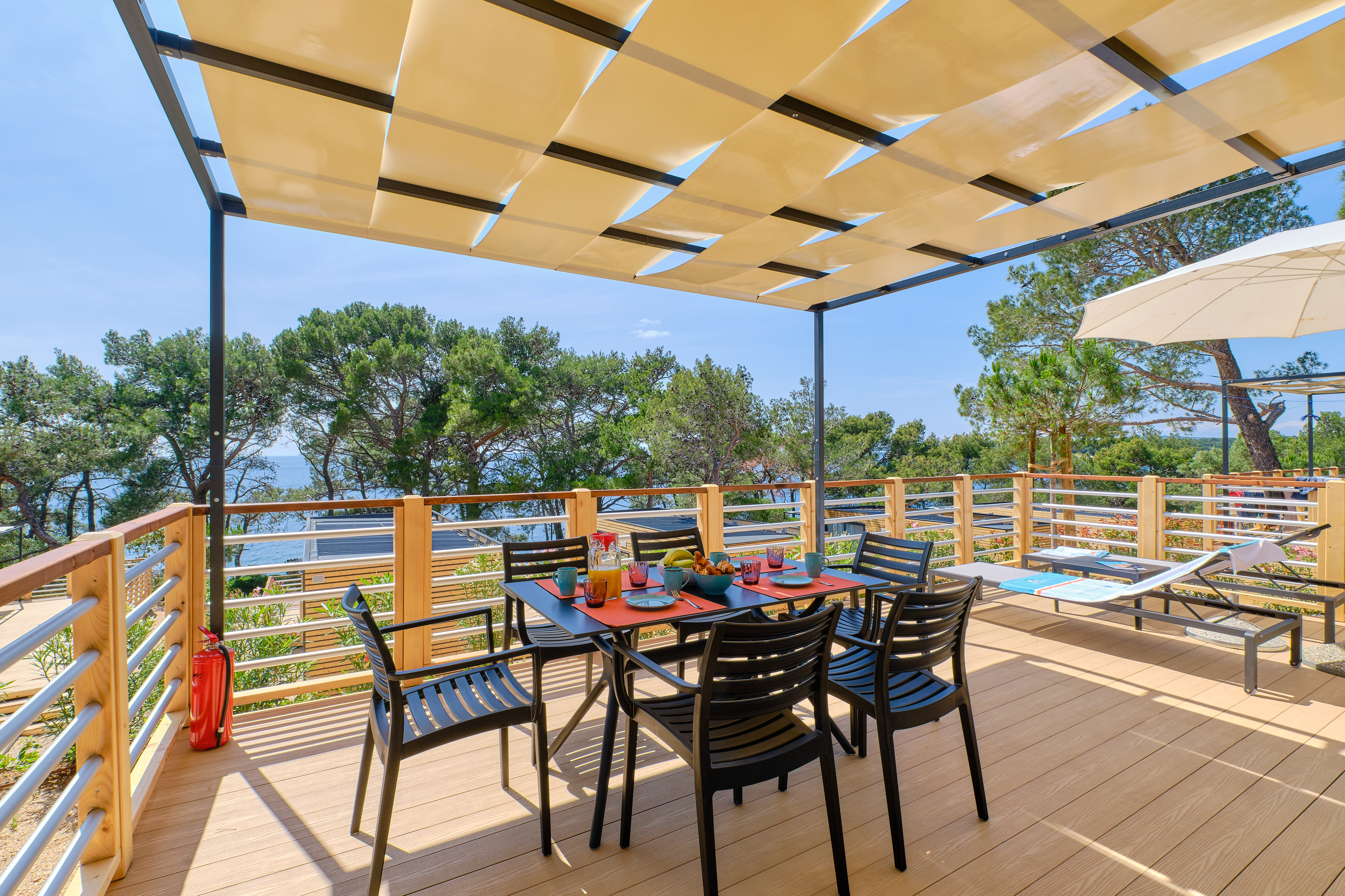 Glampingunterkunft: Mobilheim Freedhome - Terasse - Luxuriöse Mobilheime Typ Freed-Home