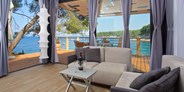 Luxuscamping - barrierefreier Zugang - Geräumiges Wohnzimmer
 - Luxuriöse Mobilheime Typ Freed-Home auf Camping Cikat
