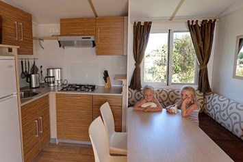 Glampingunterkunft: Küche mit Eckbank - SunLodge Aspen von Suncamp auf Camping Village Marina di Venezia