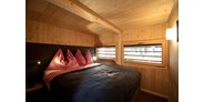 Luxuscamping - Seehöhe - Schlafzimmer mit Boxspringbett - Gravatscha