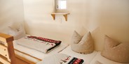 Luxuscamping - Art der Unterkunft: Bungalow - Schlafbereich auf der Galerie - Berghütten Komfort im Camping Resort Zugspitze
