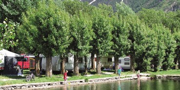 Luxuscamping - Wallis - Wunderschön am Wasser gelegen - Wohnwagen auf Camping Swiss-Plage