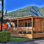 Luxuscamping: Außenansicht - Bungalow GARDENIA am Camping Tamaro Resort