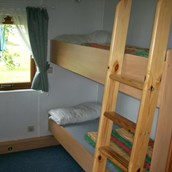 Luxuscamping: Kinderzimmer mit Stockbetten - Mobilheime Standard auf KlüthseeCamp&Seeblick
