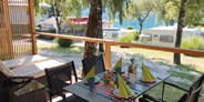 Luxuscamping - Preisniveau: exklusiv - Österreich - Terrasse SeeLodge - Seecamping Hoffmann - SeeLodges