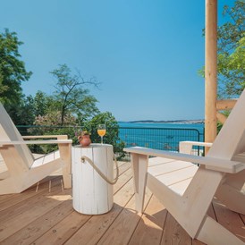Glampingunterkunft: Frühstück mit einem herrlichen Blick auf das Meer - Safari-Zelte auf Lanterna Premium Camping Resort