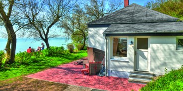 Luxuscamping - Art der Unterkunft: Strandhaus - Ferienhaus 913, 2 Personen am Camping- und Ferienpark Wulfener Hals