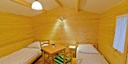 Luxuscamping - Mecklenburg-Vorpommern - Blockhütten ~ Campingpl. NATURCAMP Pruchten