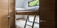 Luxuscamping - Schweiz - Mietwohnwagen Magnolia Deluxe auf Campofelice Camping Village 