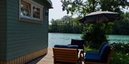 Luxuscamping - Außenbereich  - Tiny House am See - Naturcampingpark Rehberge
