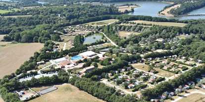 Luxuscamping - Umgebungsschwerpunkt: Stadt - Vendée - Woody Lodge auf Camping Village de La Guyonniere