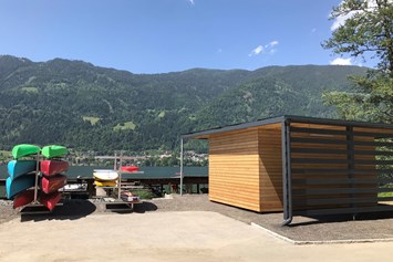 Glampingunterkunft: Wassersportstation - Ferienhaus Premium am Seecamping Berghof