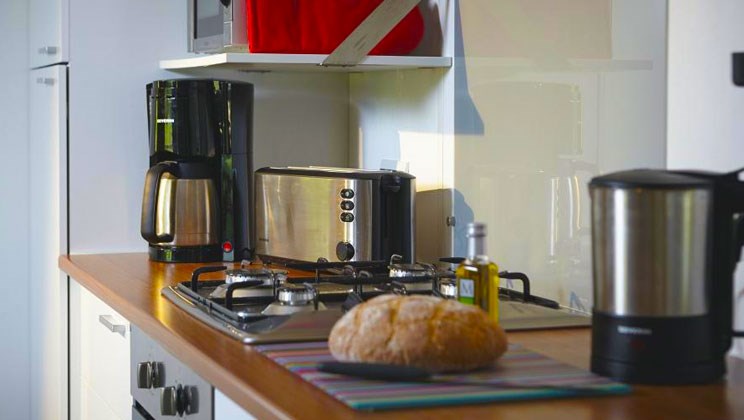 Glampingunterkunft: Gut ausgestattete Küche - Luxus-Mobilheim Aspect mit zwei Schlafzimmern am Camping Parco delle Piscine
